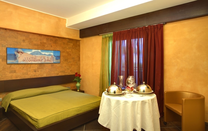 Imagen de la habitación del Hotel Abalon Pompei Resort. Foto 8