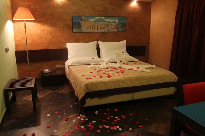 Imagen de la habitación del Hotel Abalon Pompei Resort. Foto 15