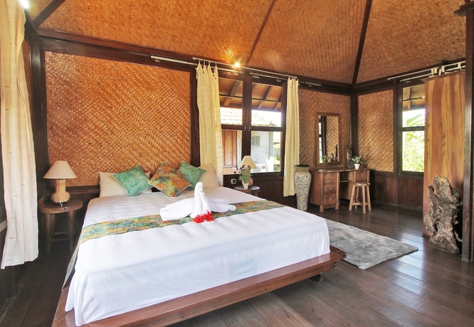 Imagen de la habitación del Hotel Abangan Bungalow. Foto 11