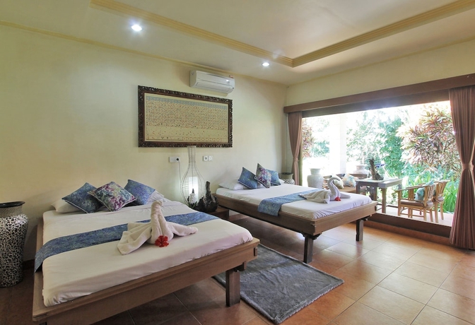 Imagen de la habitación del Hotel Abangan Bungalow. Foto 14