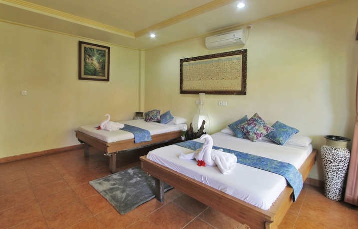 Imagen de la habitación del Hotel Abangan Bungalow. Foto 16