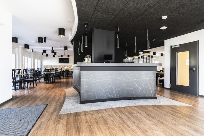 Imagen de los interiores del Hotel Abasto Hotel München Feldmoching. Foto 16