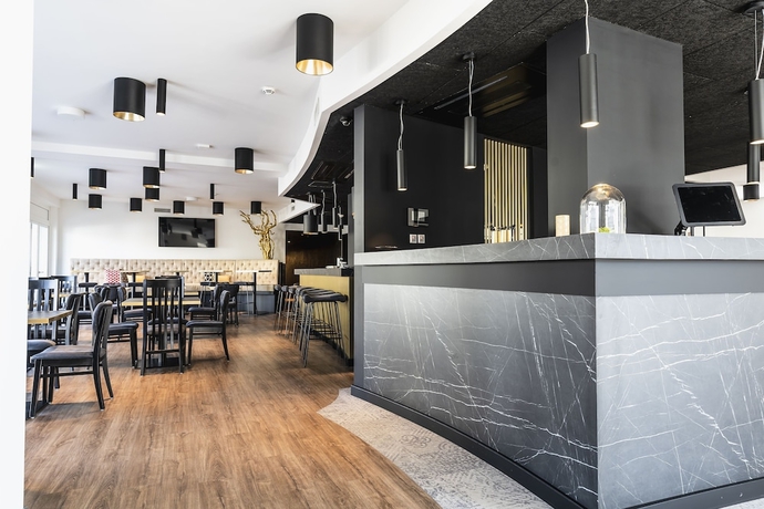 Imagen de los interiores del Hotel Abasto Hotel München Feldmoching. Foto 17