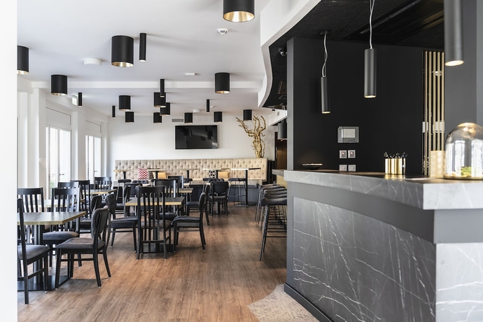 Imagen de los interiores del Hotel Abasto Hotel München Feldmoching. Foto 18