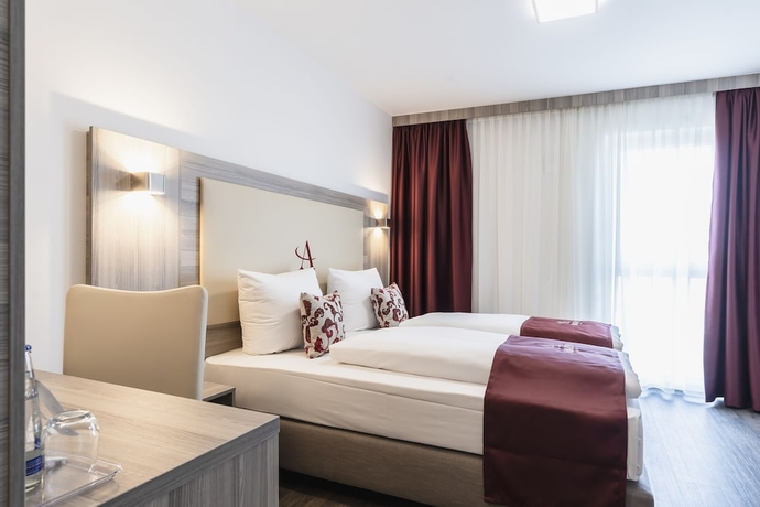 Imagen de la habitación del Hotel Abasto Hotel München Feldmoching. Foto 11