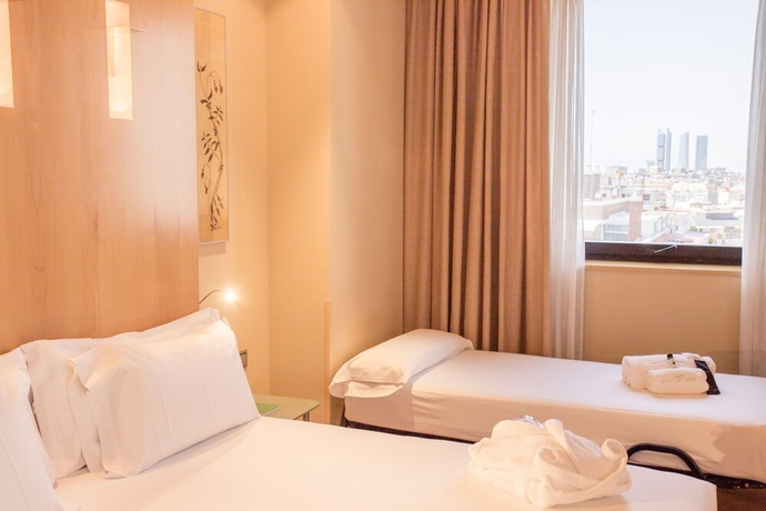 Imagen de la habitación del Hotel Abba Madrid. Foto 10