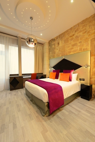 Imagen de la habitación del Hotel Abbatial Saint Germain. Foto 12