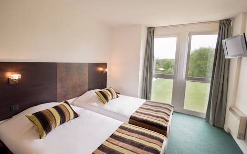 Imagen de la habitación del Hotel Abbaye Du Golf De Lésigny. Foto 5