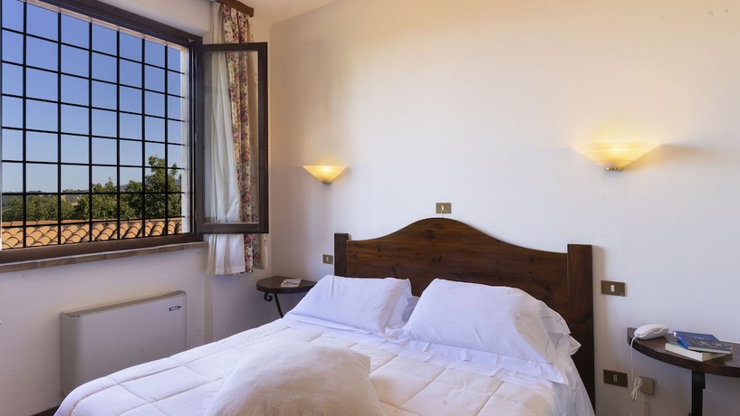 Imagen de la habitación del Hotel Abbazia Collemedio Resort and Spa. Foto 12