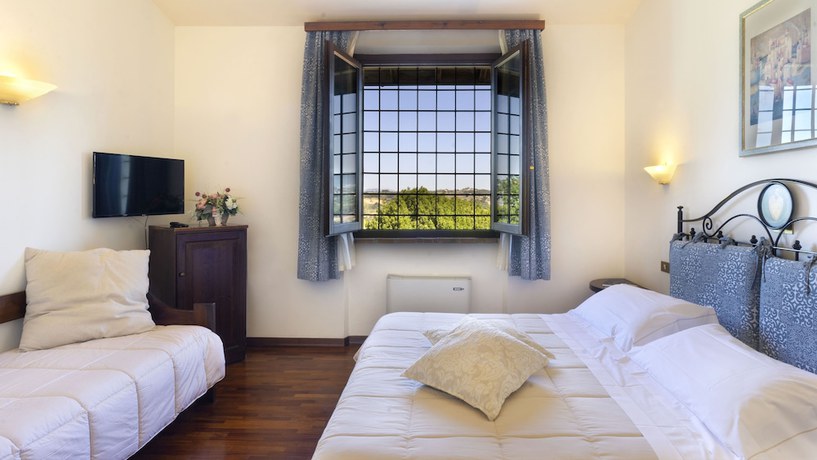 Imagen de la habitación del Hotel Abbazia Collemedio Resort and Spa. Foto 15