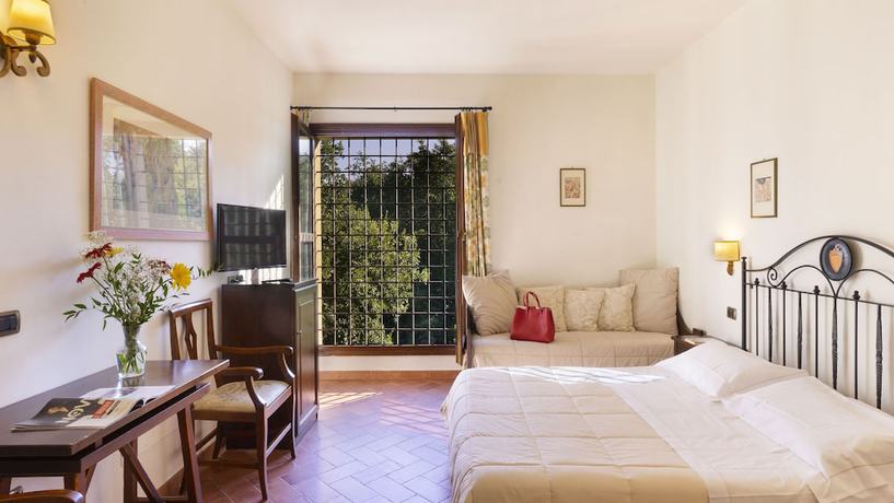 Imagen de la habitación del Hotel Abbazia Collemedio Resort and Spa. Foto 17
