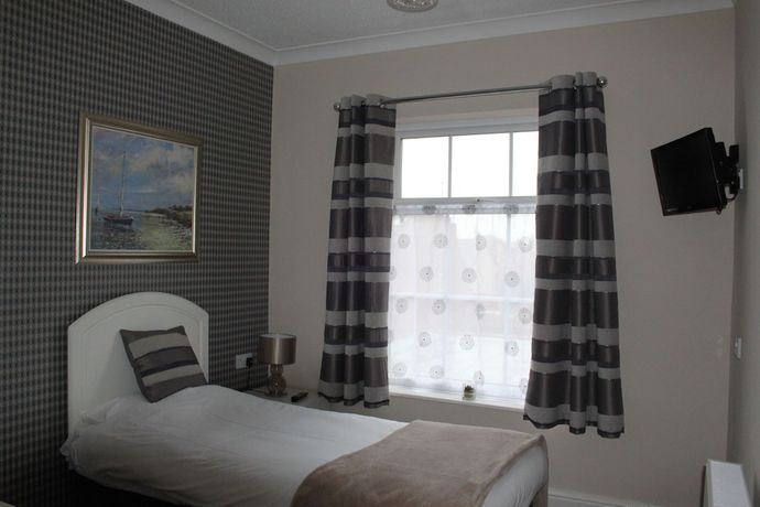 Imagen de la habitación del Hotel Abbey Grange. Foto 9