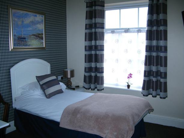 Imagen de la habitación del Hotel Abbey Grange. Foto 11