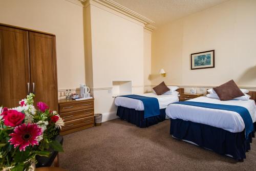 Imagen de la habitación del Hotel Abbey Lawn. Foto 10