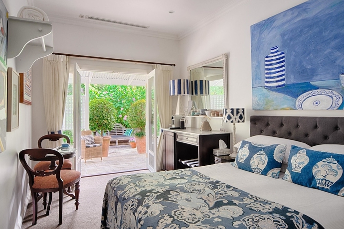 Imagen de la habitación del Hotel Abelia House. Foto 7