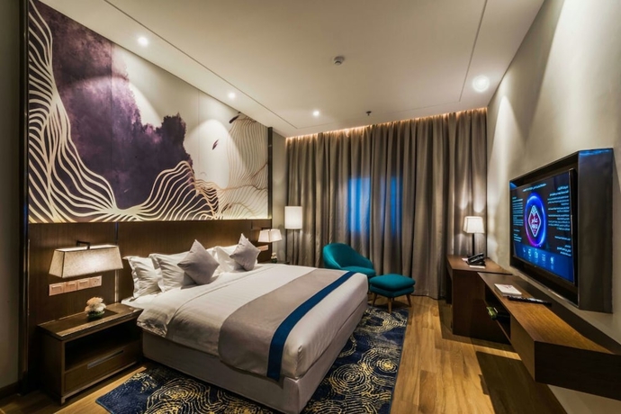 Imagen de la habitación del Hotel Aber Al Sahafa. Foto 7