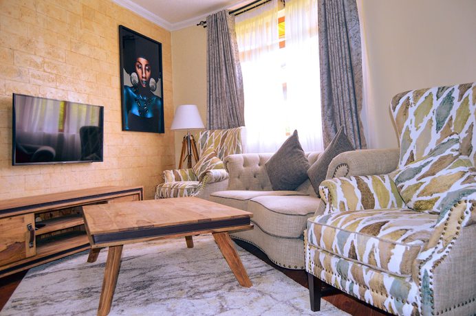 Imagen de la habitación del Hotel Aberdare Prestige And Royal Cottages. Foto 2