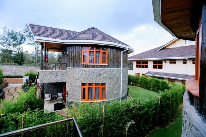 Imagen de la habitación del Hotel Aberdare Prestige And Royal Cottages. Foto 8