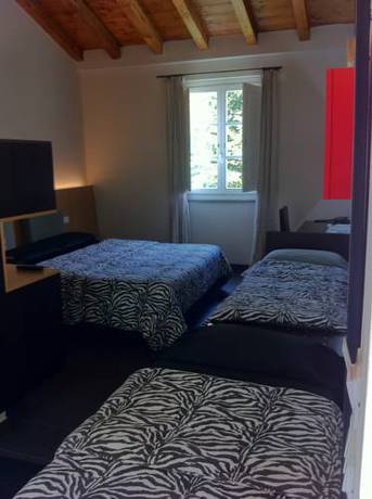 Imagen de la habitación del Hotel Abetaia. Foto 15