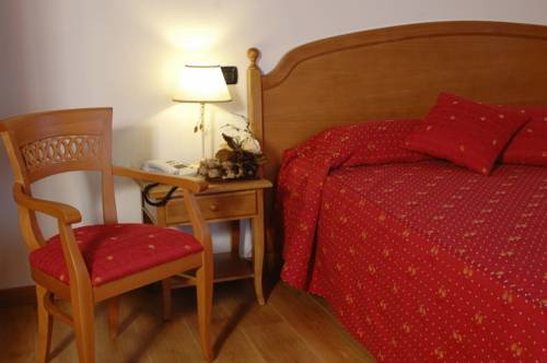 Imagen de la habitación del Hotel Abetone E Piramidi Resort. Foto 8