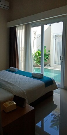 Imagen de la habitación del Hotel Abhaya Villa. Foto 9