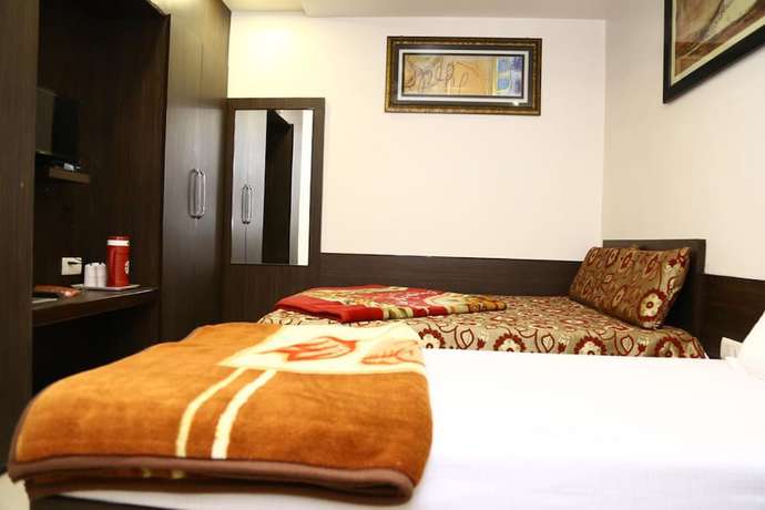 Imagen de la habitación del Hotel Abhinandan Inn Jaipur. Foto 19