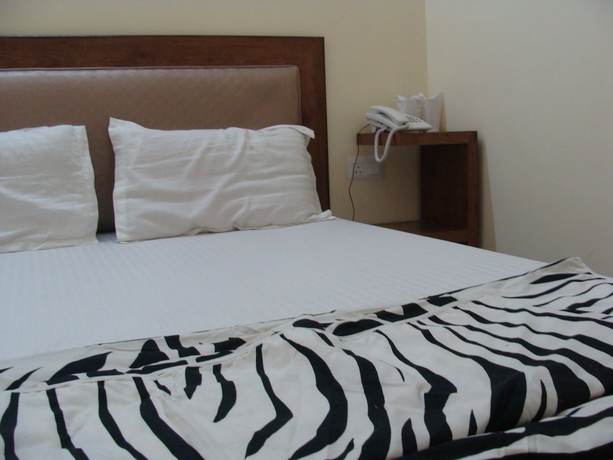 Imagen de la habitación del Hotel Abhinandan grand. Foto 4
