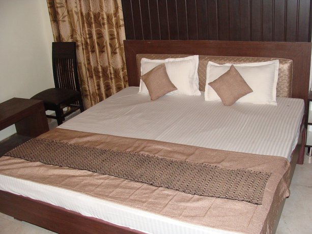 Imagen de la habitación del Hotel Abhinandan grand. Foto 5