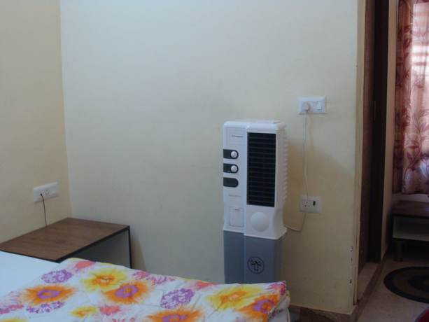 Imagen de la habitación del Hotel Abhinandan grand. Foto 7