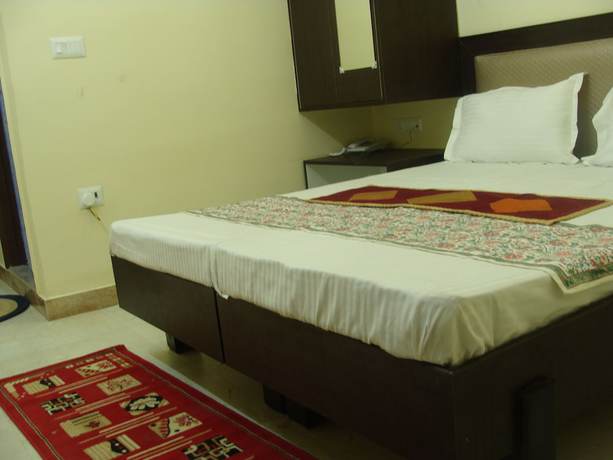 Imagen de la habitación del Hotel Abhinandan grand. Foto 10