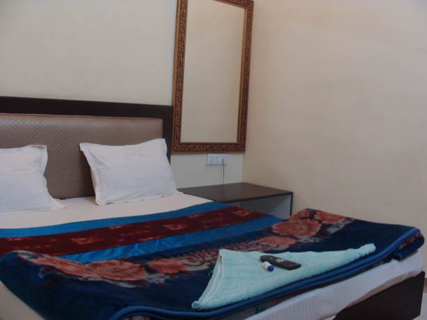 Imagen de la habitación del Hotel Abhinandan grand. Foto 13