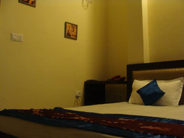 Imagen de la habitación del Hotel Abhinandan grand. Foto 17