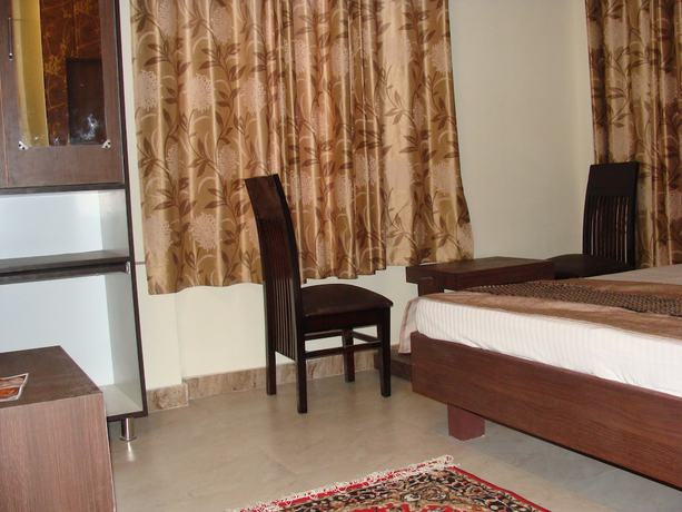 Imagen de la habitación del Hotel Abhinandan grand. Foto 18