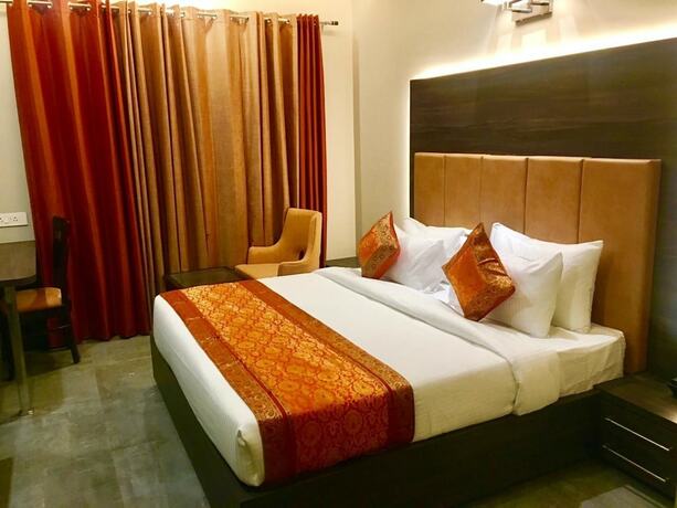 Imagen de la habitación del Hotel Abhinav International. Foto 22