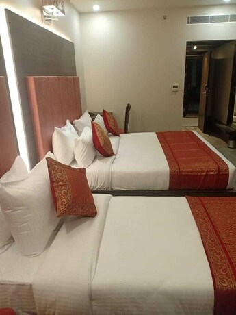 Imagen de la habitación del Hotel Abhinav International. Foto 24