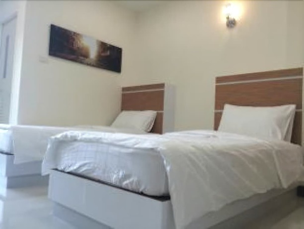 Imagen de la habitación del Hotel Able Resident Hat Yai. Foto 12