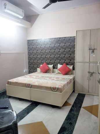 Imagen de la habitación del Hotel Abode Homestay. Foto 8