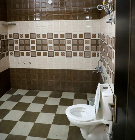 Imagen de la habitación del Hotel Abodes House. Foto 9