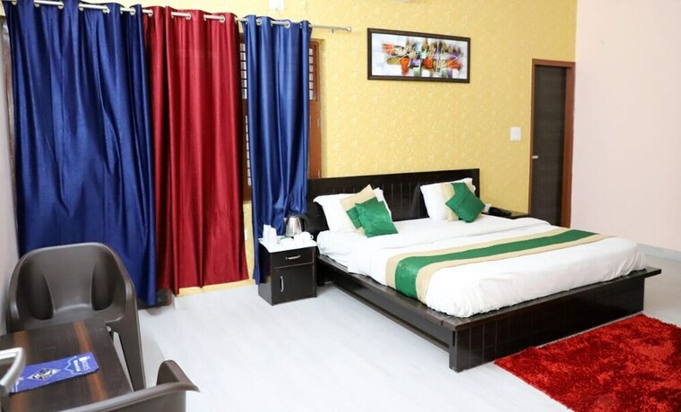 Imagen de la habitación del Hotel Abodes House. Foto 11