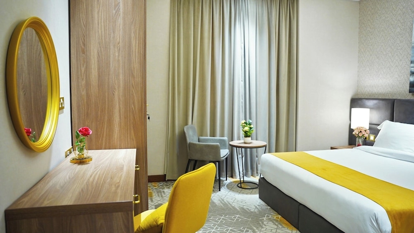 Imagen de la habitación del Hotel Abraj INN Suites hotel. Foto 5