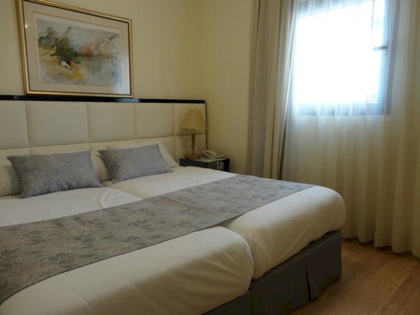 Imagen de la habitación del Hotel Abratel Suites. Foto 10