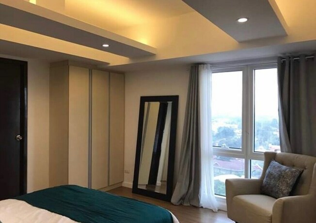 Imagen de la habitación del Hotel Abreeza Place Apartments. Foto 21