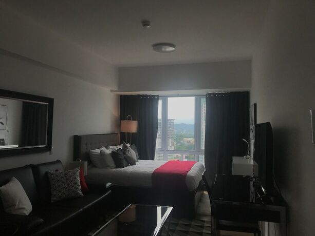 Imagen de la habitación del Hotel Abreeza Place Apartments. Foto 23