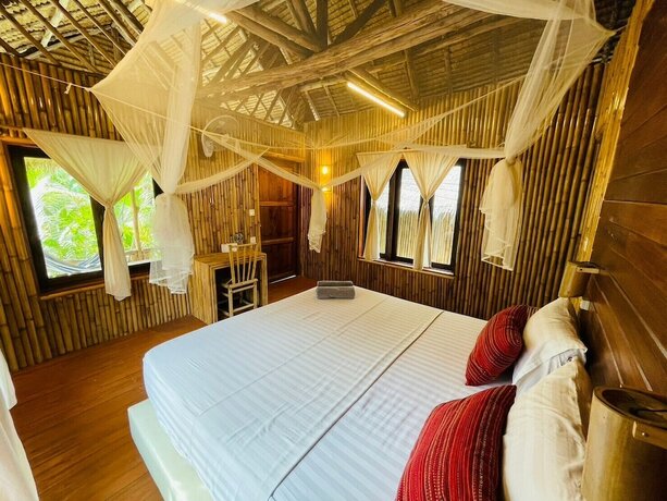 Imagen de la habitación del Hotel Absolute Beachfront Resort. Foto 11