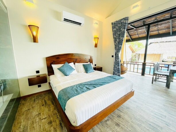 Imagen de la habitación del Hotel Absolute Beachfront Resort. Foto 20