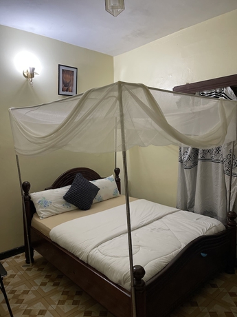 Imagen de la habitación del Hotel Abyssinia Guesthous Entebbe. Foto 9