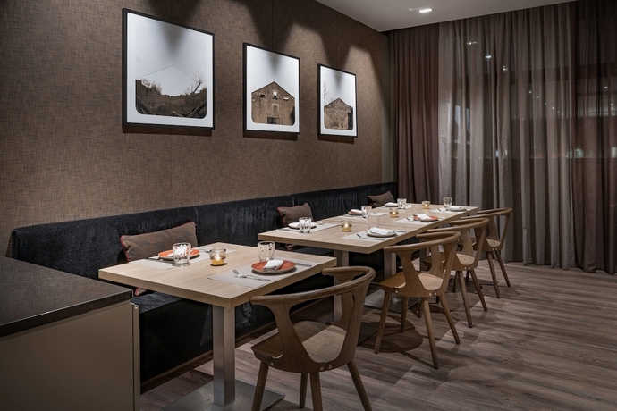 Imagen del bar/restaurante del Hotel Ac Bologna By Marriott. Foto 4