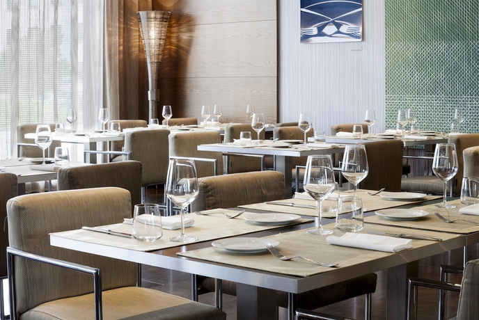 Imagen del bar/restaurante del Hotel Ac Brescia By Marriott. Foto 2