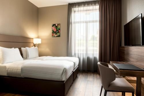 Imagen de la habitación del Hotel Ac Mainz. Foto 6