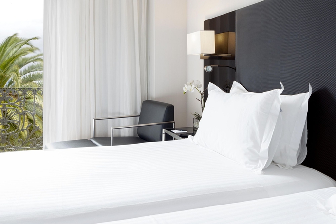 Imagen de la habitación del Hotel Ac Palacio Universal By Marriott. Foto 10